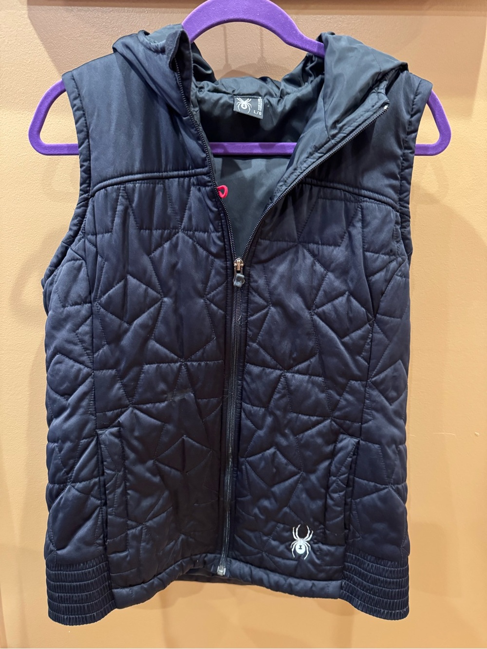 Spyder Black Quilted Hooded Sleeveless Women’s Vest size Large (stain In front)